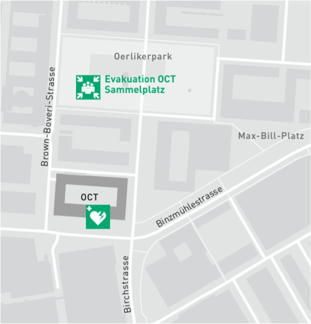 Defibrillators and assembly point of the OCT building. Description in text